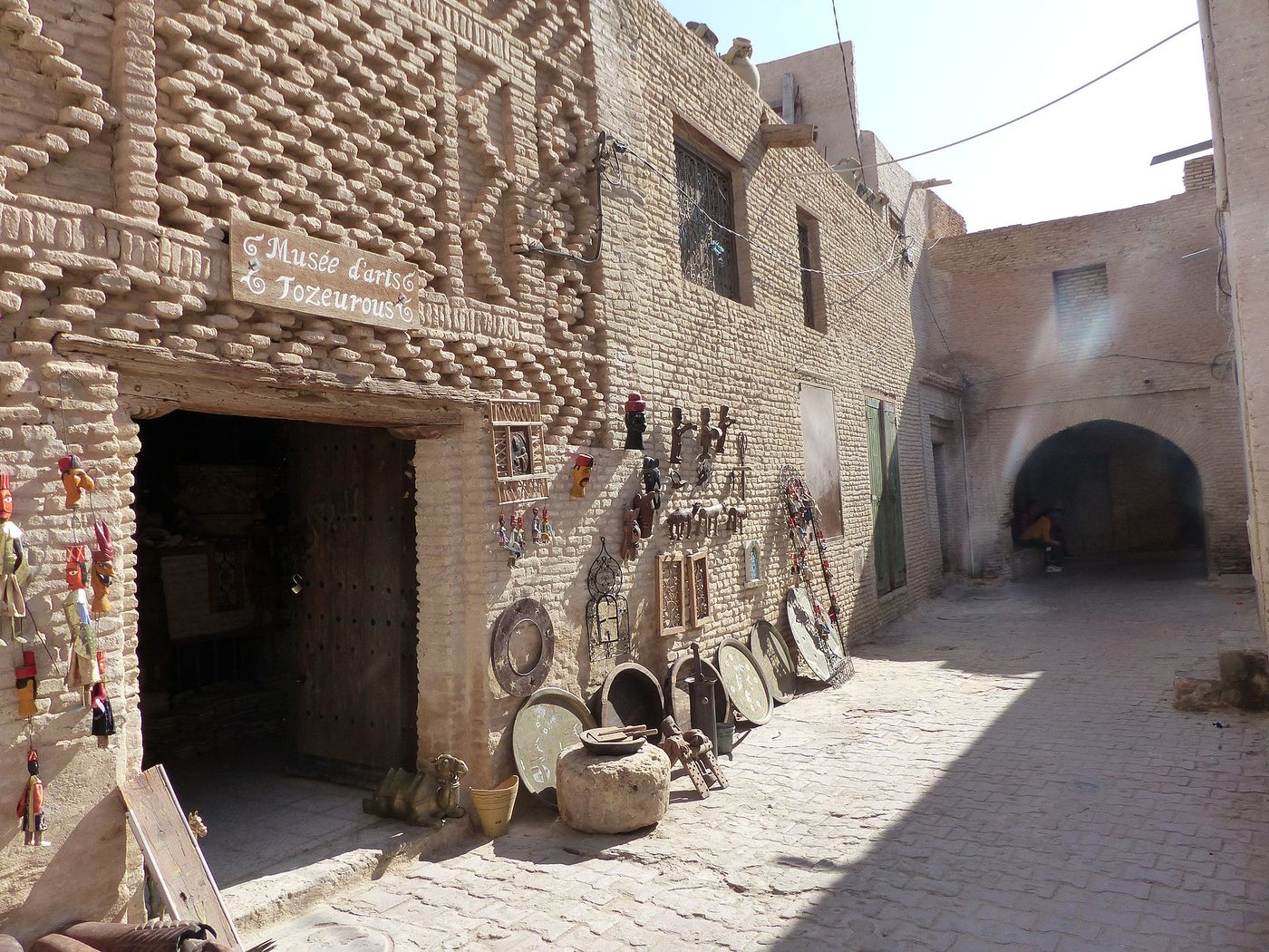The ochre-brick medina of Tozeur, gateway to the Tunisian Sahara