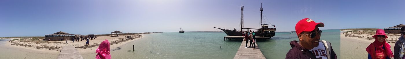 The white sandspit and shallow turquoise lagoon of Ras Rmel, known as Flamingo Island, off Houmt Souk in Djerba, Tunisia