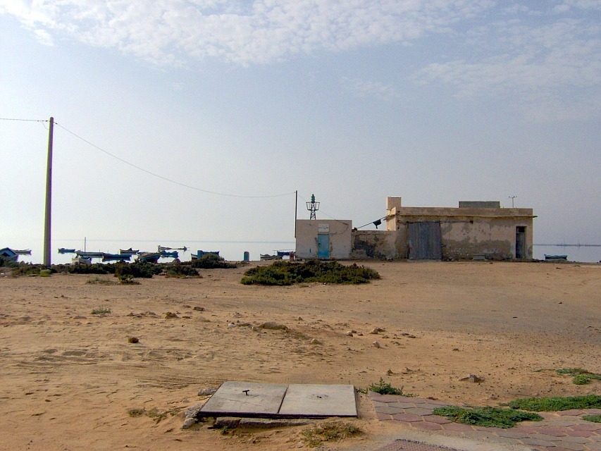 The quiet shore at El Kantara, where a causeway links Djerba to the mainland near Zarzis