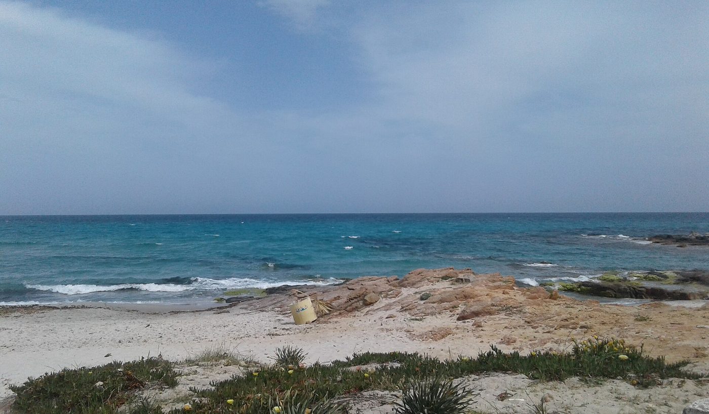 The white sand and clear water of Mansoura beach near Kelibia, Tunisia