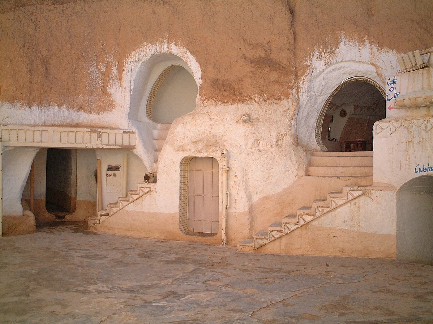 A sunken troglodyte courtyard house at Matmata, one of the classic day trips from Djerba
