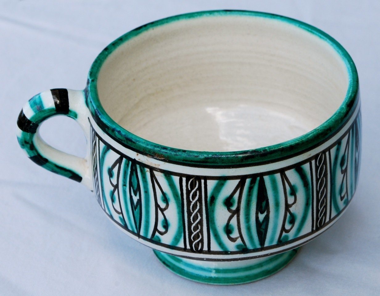 Colourful glazed Nabeul ceramics and painted storage jars, the craft of Cap Bon