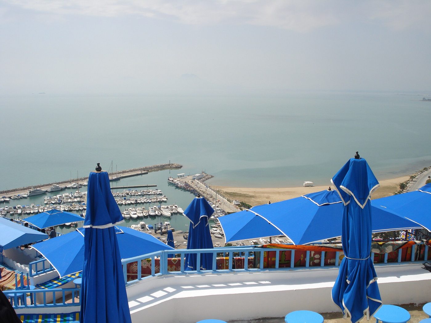 A traditional blue-and-white cafe terrace overlooking the sea at Sidi Bou Said