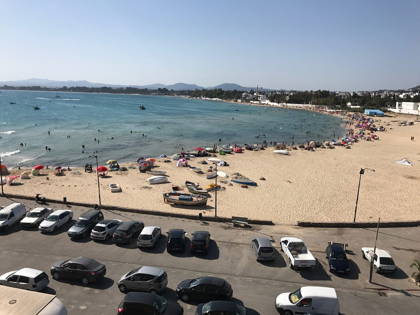 The long sandy beach and warm sea at Hammamet, Tunisia's flagship all-inclusive resort town