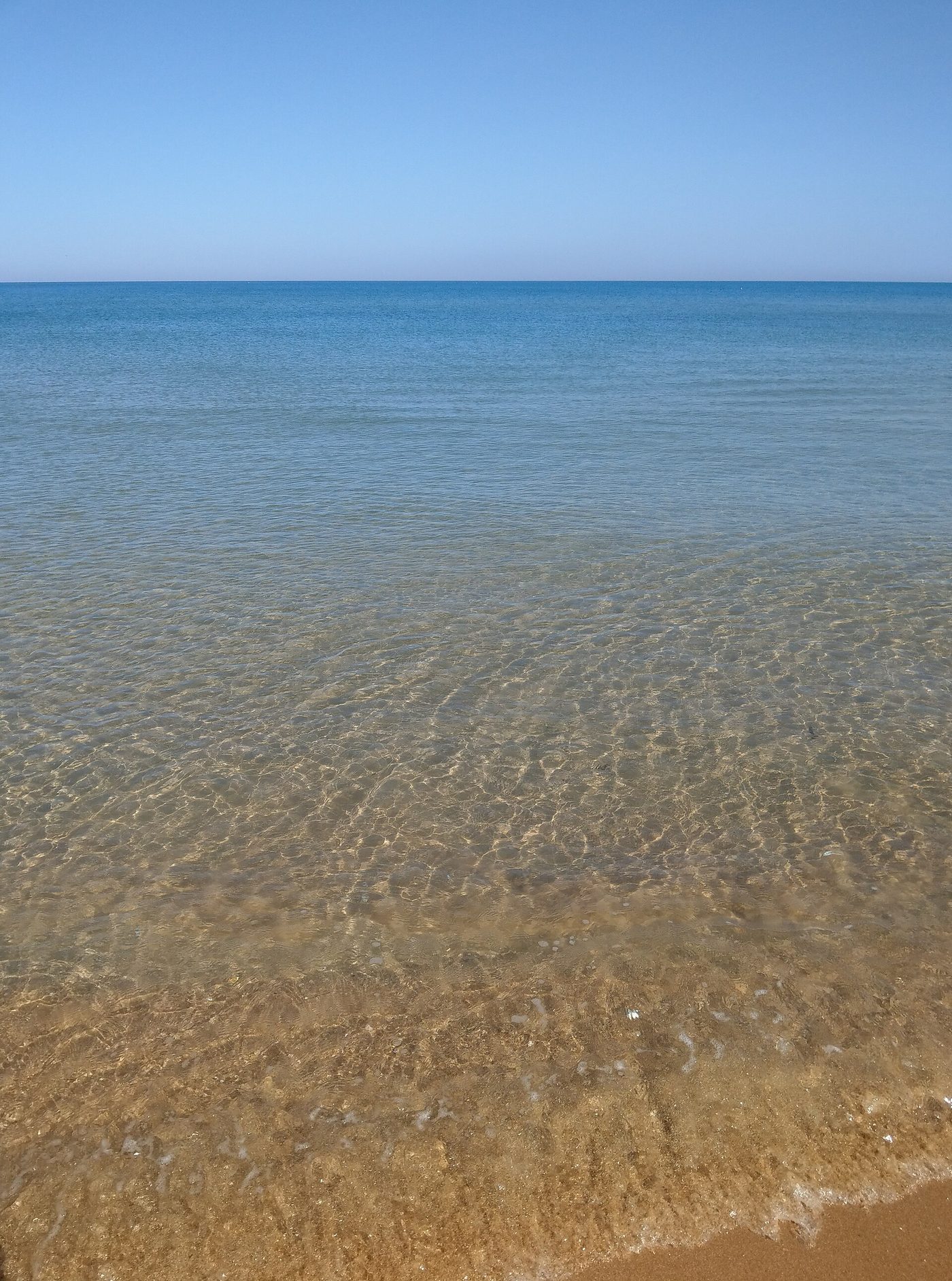 Clear shallow water on the beach at Yasmine Hammamet