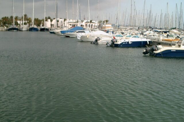 Boats and waterfront restaurants along the marina at Yasmine Hammamet, Tunisia