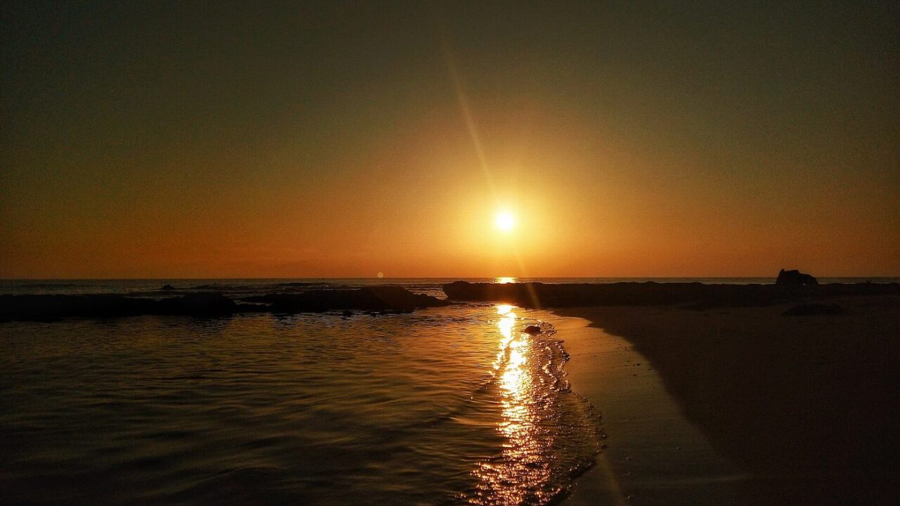 Sunrise over Chatt Amira beach at Souihel, Zarzis