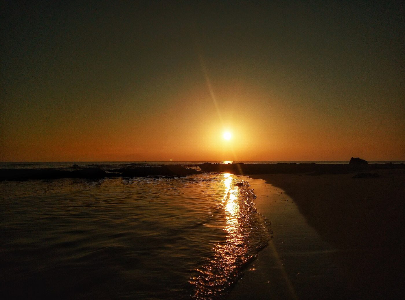 Sunrise over Chatt Amira beach at Souihel, Zarzis