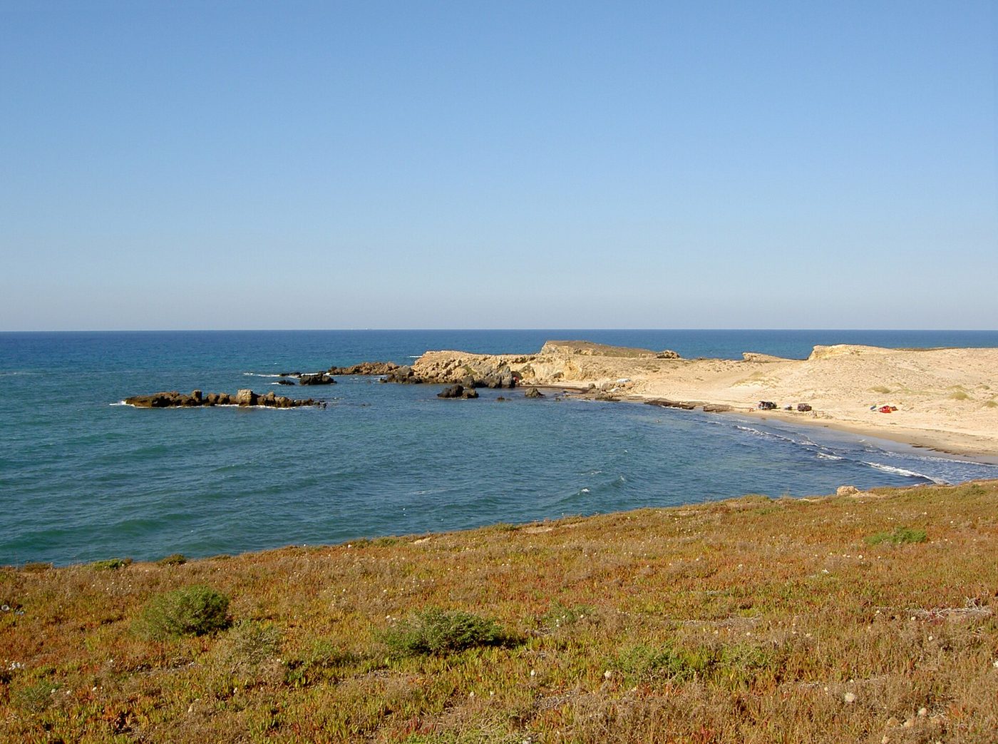 The low cliffs and small beach at Cap Angela, the northernmost point of mainland Africa