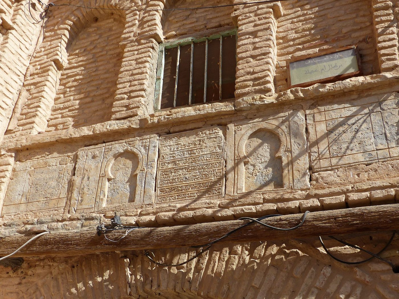 Patterned brick facades in the old quarter of Tozeur, deep in Tunisia's south