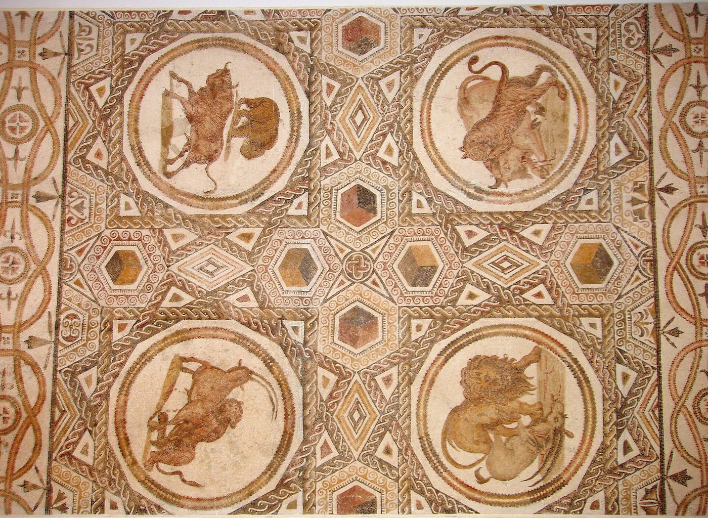 Roman hunting-scene mosaic with lion and leopard roundels at the El Jem Archaeological Museum, Tunisia